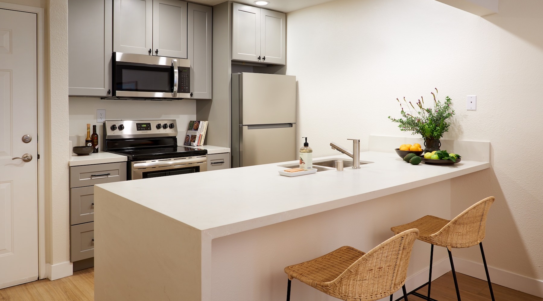 a kitchen with bar stools