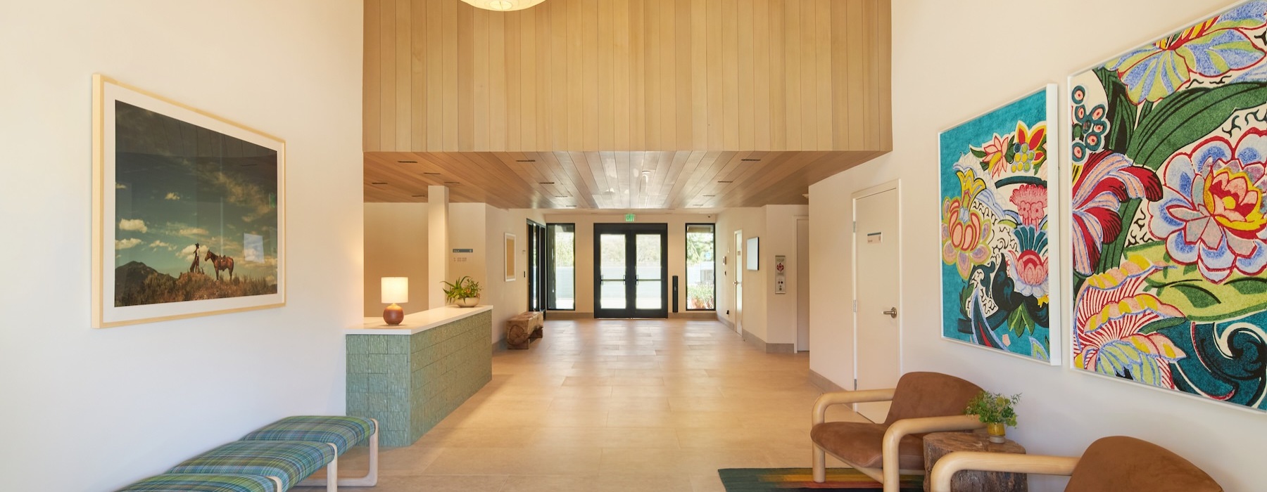 a leasing office lobby with chairs