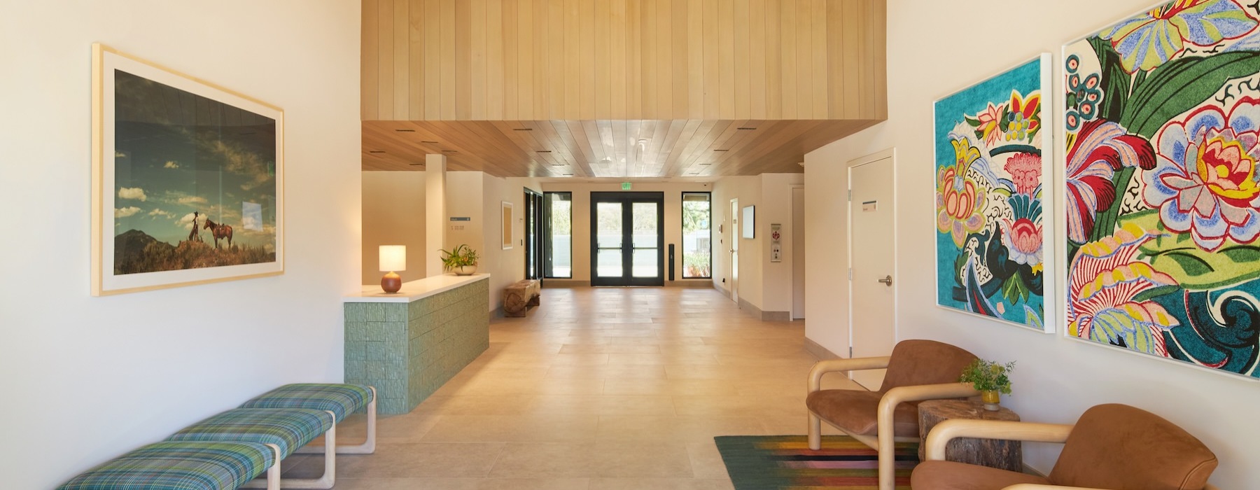 a leasing office lobby with chairs