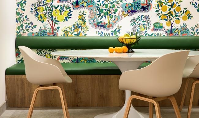 a room with a table and chairs