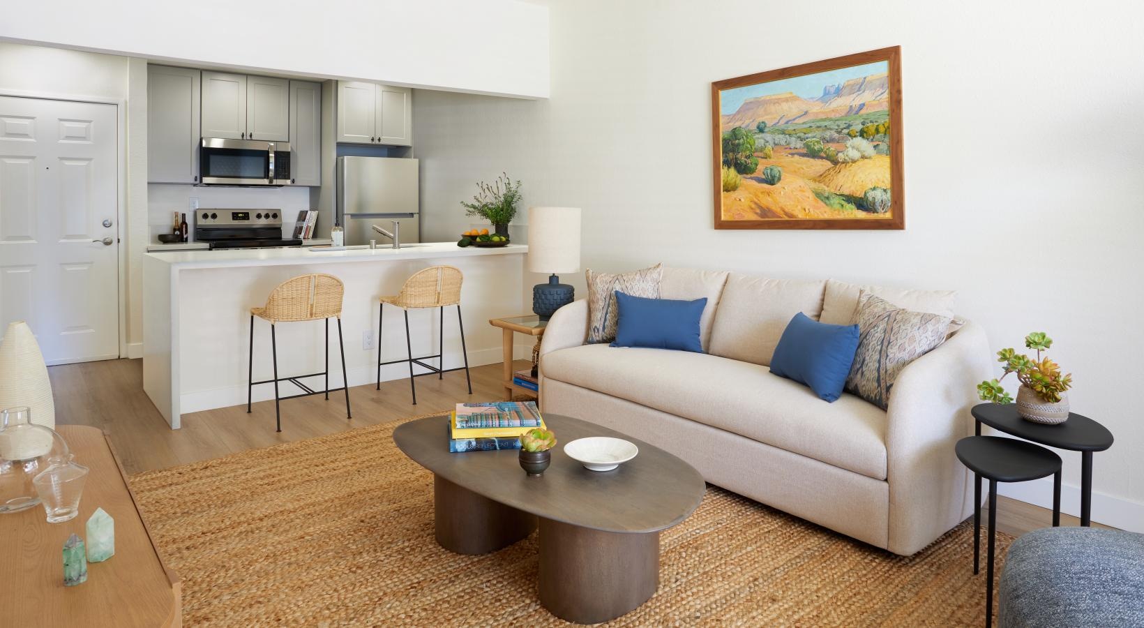 a living room with a couch and a table
