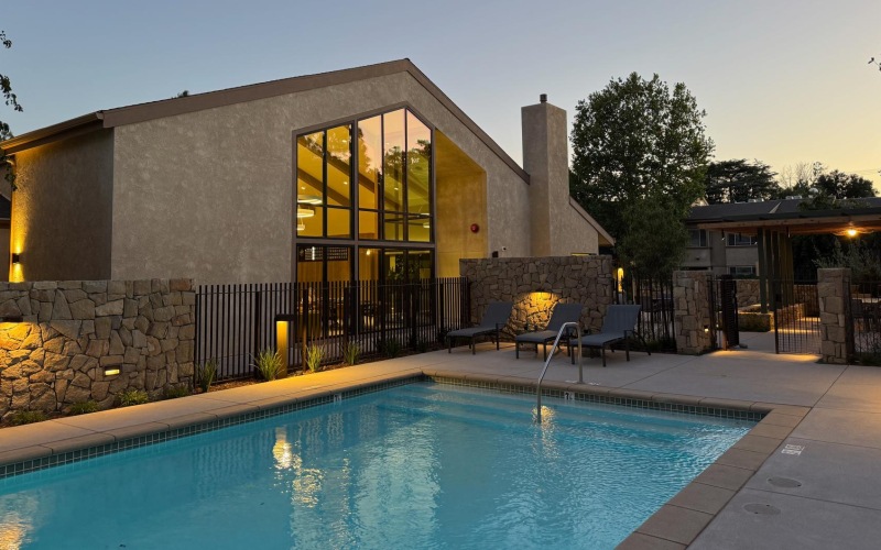 a swimming pool outside a building